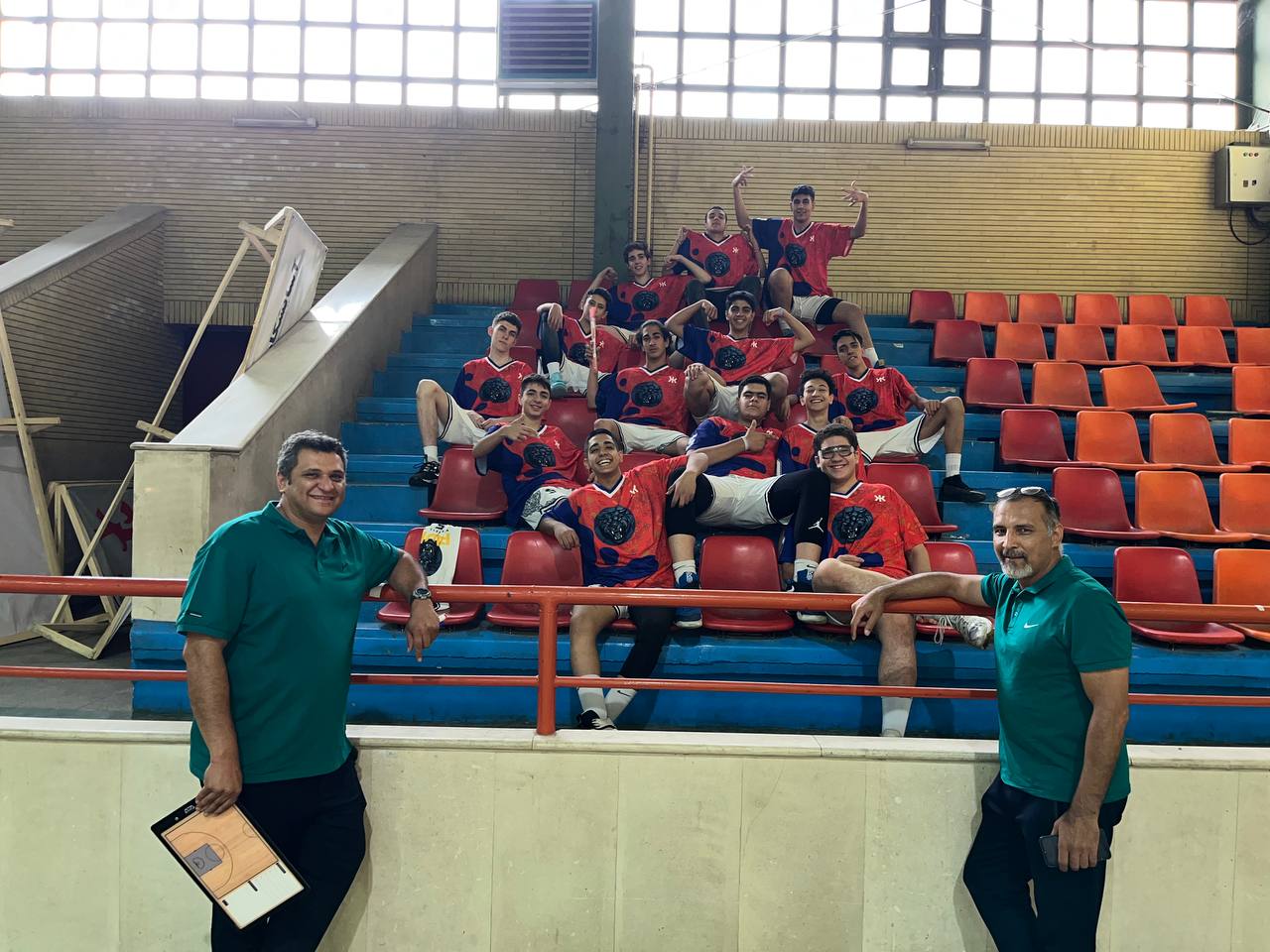 Youth Team & Coaches · Fun Pose on Bleachers