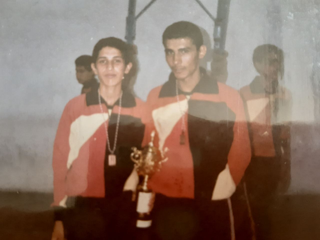 Archive · Two Champions with Small Trophy